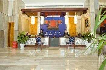 Miaozu Buyi Hotel Финхуан Екстер'єр фото